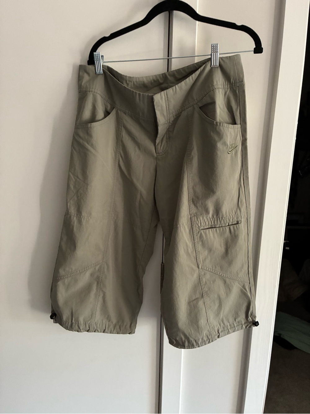 Nike Olive Green Cargo short/capris that hit at the knee.